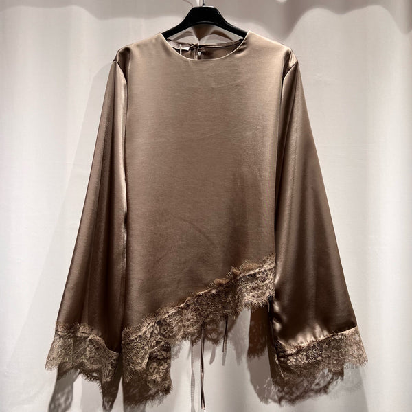 Asymmetrische kanten blouse