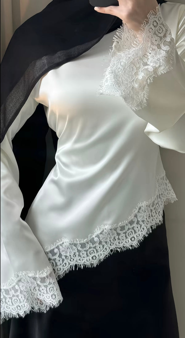 Asymmetrische kanten blouse