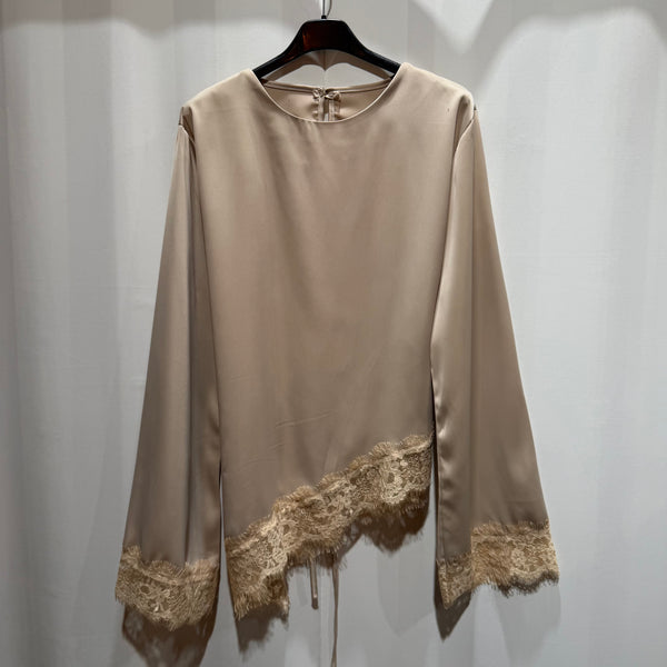 Asymmetrische kanten blouse