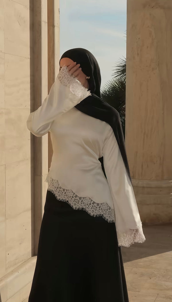 Asymmetrische kanten blouse